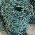 Green color PVC coated barbed wire fencing for security