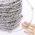 High tensile single or 2 strand galvanized iron wire spiral woven barbed wire fence